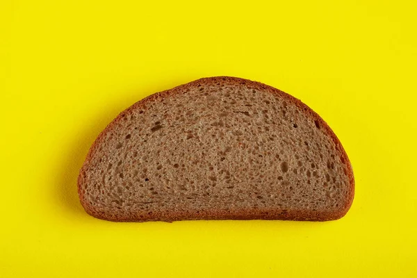 Fresh Delicious Slice Rye Bread Yellow Background — Stock Photo, Image