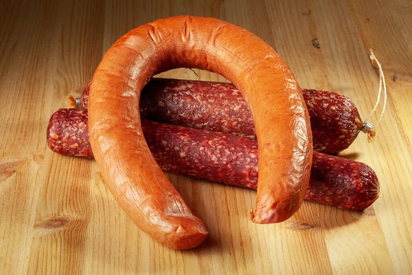 Various Varieties Smoked Sausage Wooden Pine Table — Stock Photo, Image