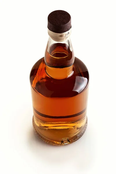 Full Bottle Strong Whiskey Light Background — Stock Photo, Image