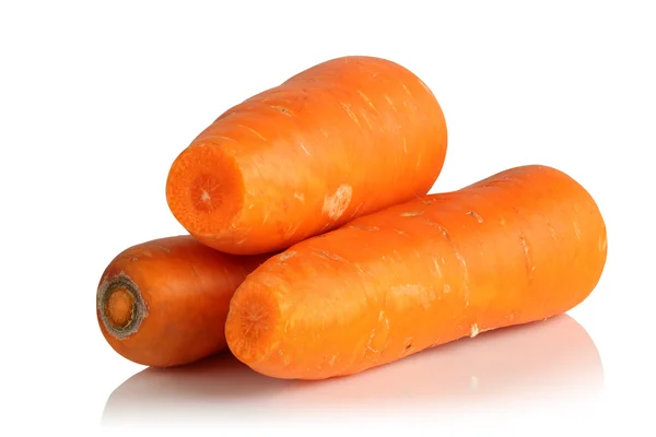 Three clean the carrots — Stock Photo, Image