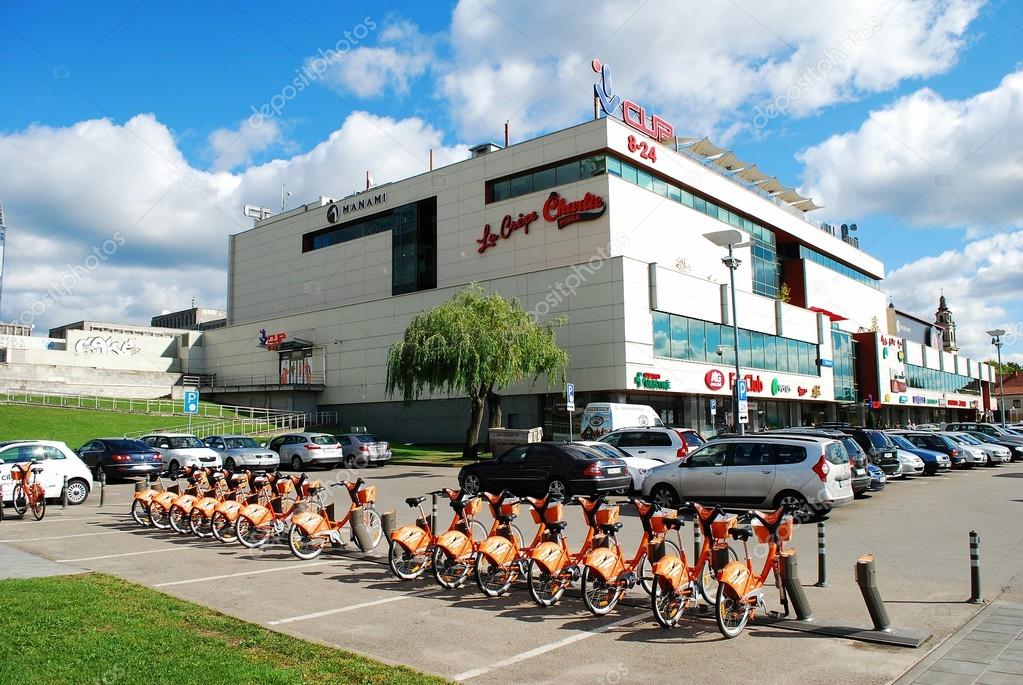 Vilnius city shop center CUP and orange cycles Stock Editorial Photo