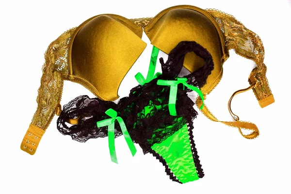 A yellow bra and green panties close-up on the white background — Stock Photo, Image