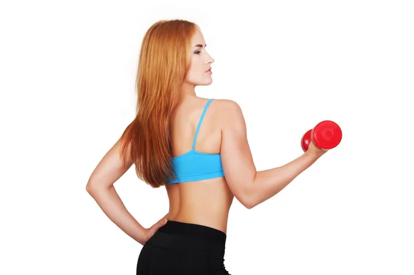 Young fit woman lifting dumbbells on white background — Stock Photo, Image