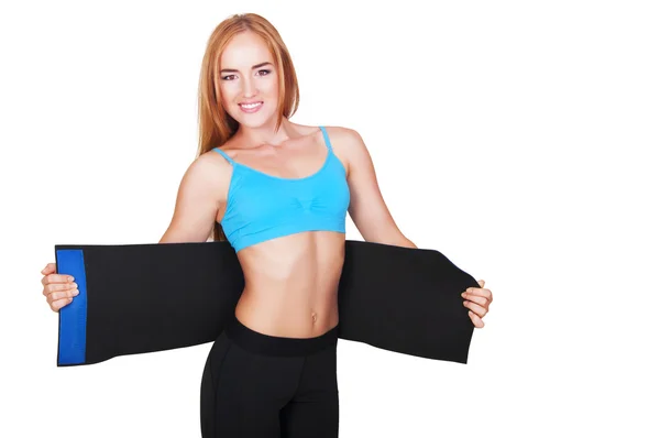 Mulher fazendo fitness usando cinto para perda de peso — Fotografia de Stock