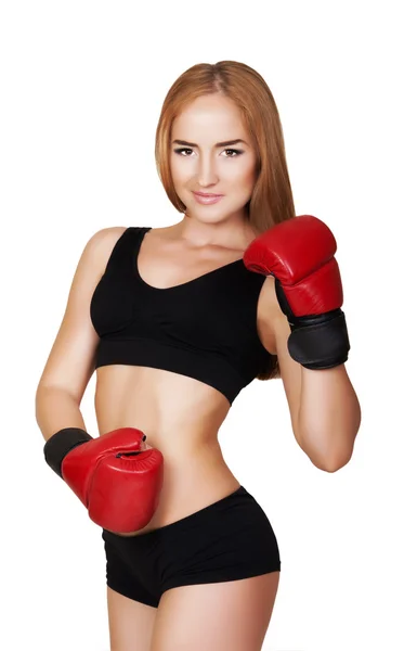 Mooie vrouw met de rode bokshandschoenen — Stockfoto