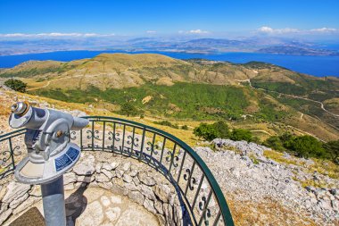 View of Corfu island from the top of Mount Pantokrator, Greece clipart
