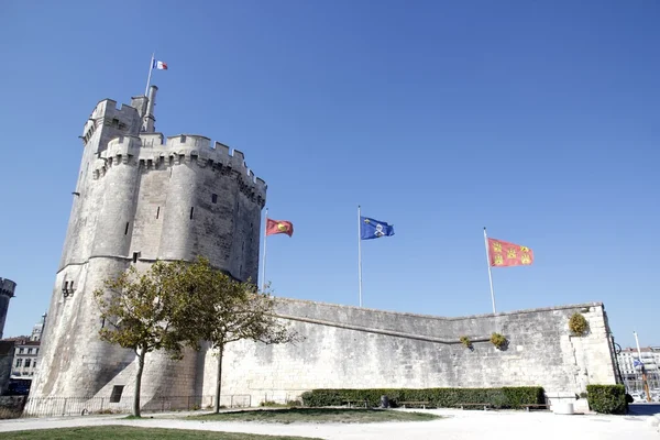 Entrance of the Port of La Rochelle, fortifications and flags (Charente-Maritime France) — Stock Photo, Image