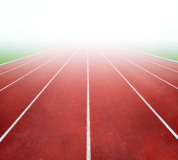 Running track with bright light — Stock Photo, Image