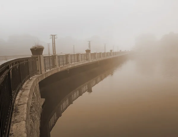 Bridge in heavy fog — Stock Photo, Image