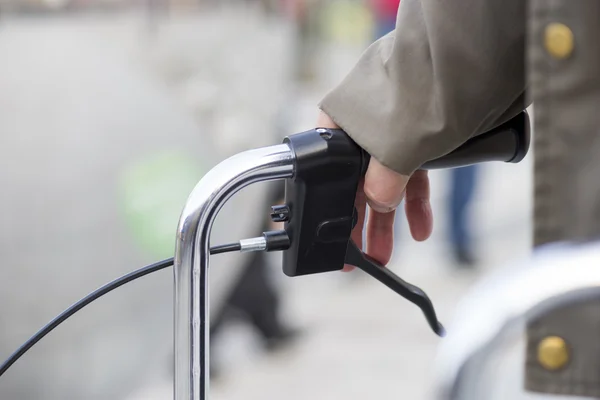 Hand holding handle of walking frame — Stock Photo, Image