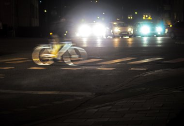 Back lit cyclist clipart