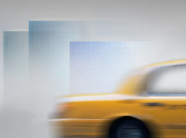 Yellow cab in blurred motion — Stock Photo, Image