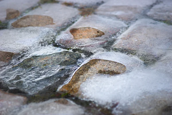 Cobble stones covered in ice — Stock Photo, Image