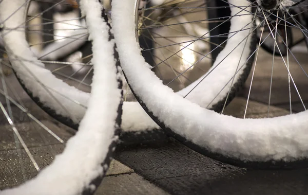 Wheels of parked bikes — Stock Photo, Image