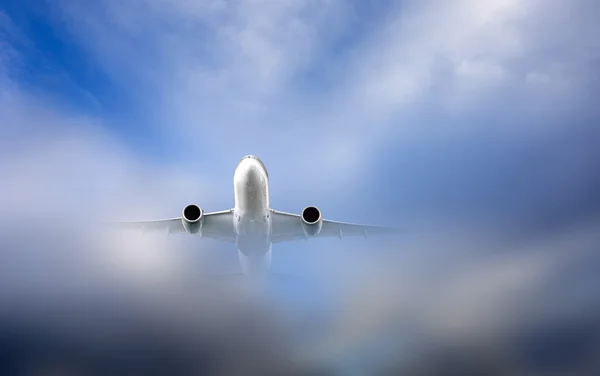 Aircraft just coming out of the clouds — Stock Photo, Image