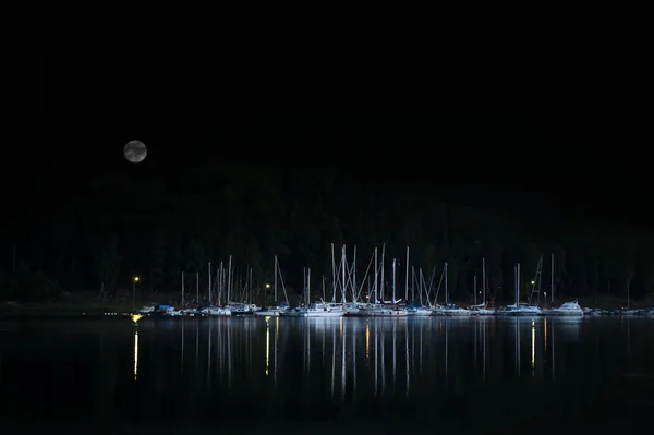 Moored yachts at night — Stock Photo, Image