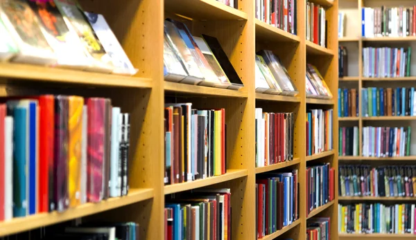 Shelves with many books — Stock Photo, Image