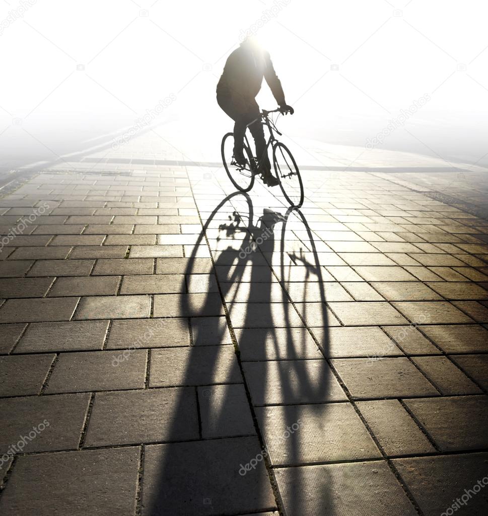 Back lit cyclist in evening light