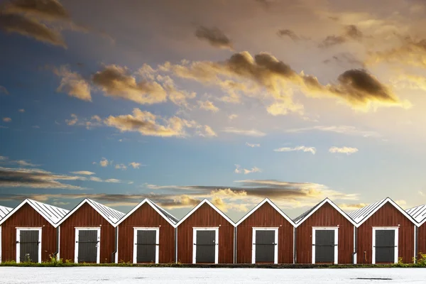 Row of traditional boathouses — Stock Photo, Image