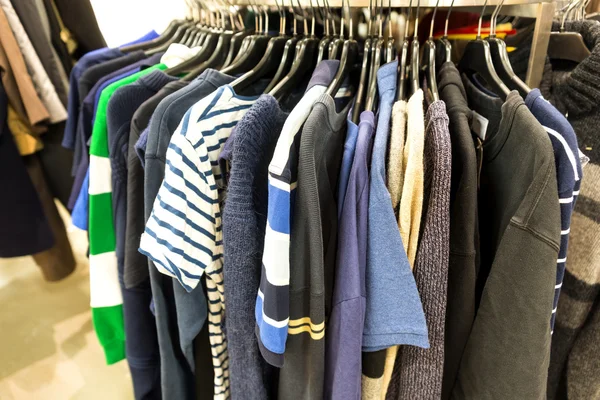 Sweaters and t-shirts for sale — Stock Photo, Image