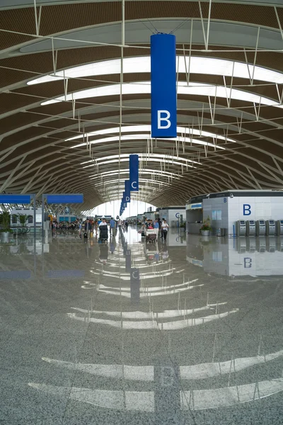 Airport terminal with reflection in floor — Stock Photo, Image