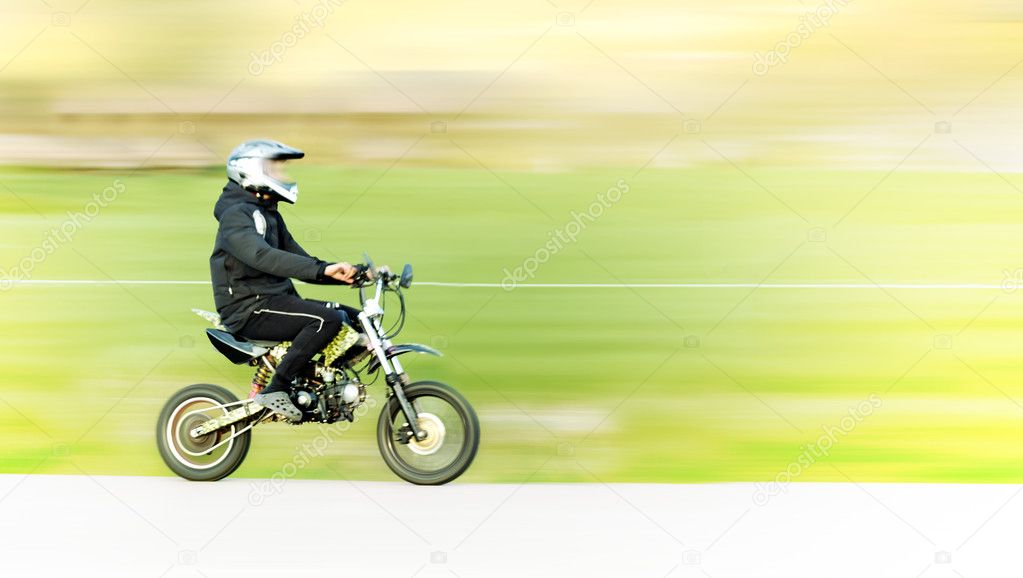 Young man on motorbike