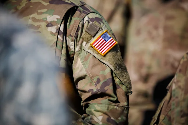 USA flagga och Us Army patch på lodets uniform — Stockfoto