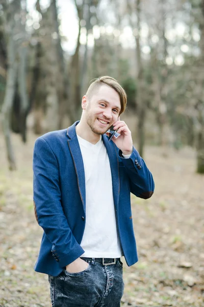 Happy man talking on mobile