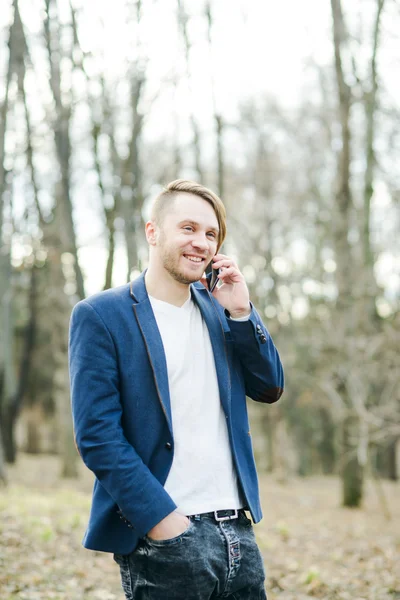 Happy man talking on mobile