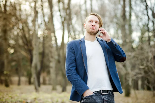 Happy man talking on mobile