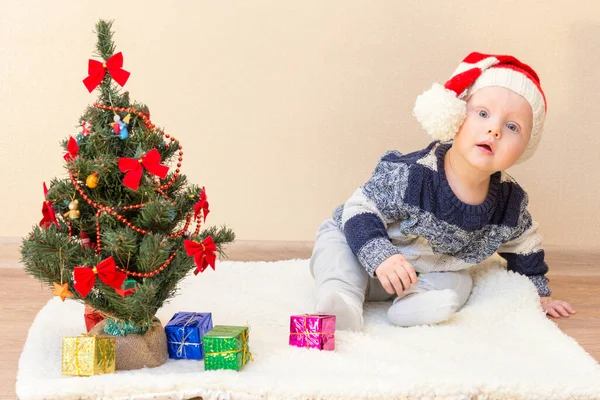 Funny Baby Santa Claus Hat Sitting Christmas Tree Small Gifts — Stock Photo, Image