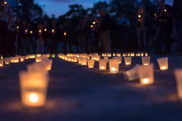 Group Candles Burning Street Asphalt People Background Day Remembrance Bereaved — Stock Photo, Image