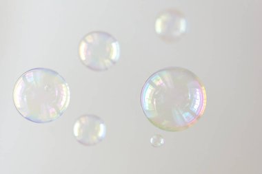 Photo of multi-colored soap bubbles, creative background, selective focus clipart