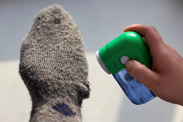 Woman Removes Lint Wool Socks Help Electric Machine Close — Stock Photo, Image