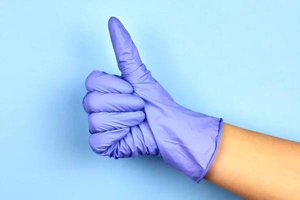 Woman Hand Medical Glove Shows Gesture Class Blue Background — Stock Photo, Image