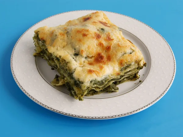 Pasta lasagne with spinach filling au gratin — Stock Photo, Image