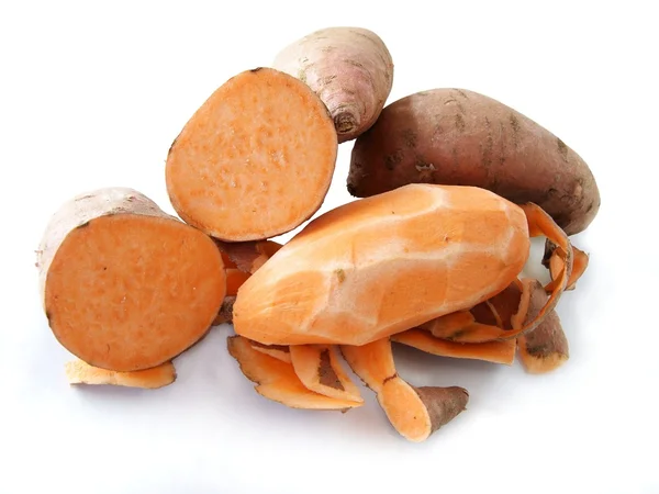 Orange, sweet patatoes batatas — стоковое фото