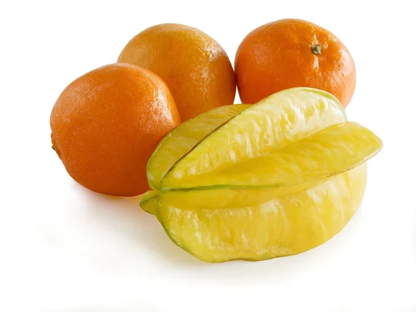 Carambola frutta gialla e arance — Foto Stock