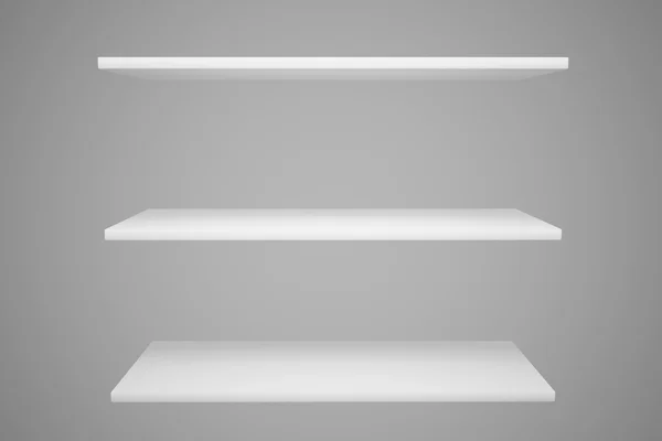 White shelves isolated on gray background — Stock Photo, Image