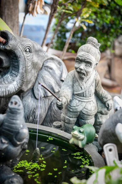 Fechar de Escultura Homem de Pesca — Fotografia de Stock