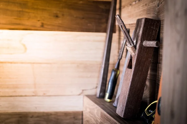 Closeup of planer tool on wood shelf — Stock Photo, Image