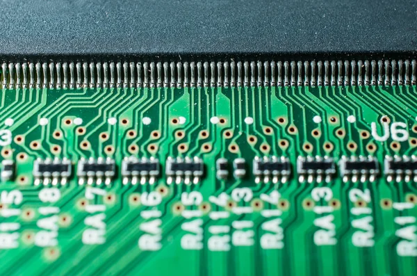 Closeup of leg chip and transistor electronic board — Stock Photo, Image