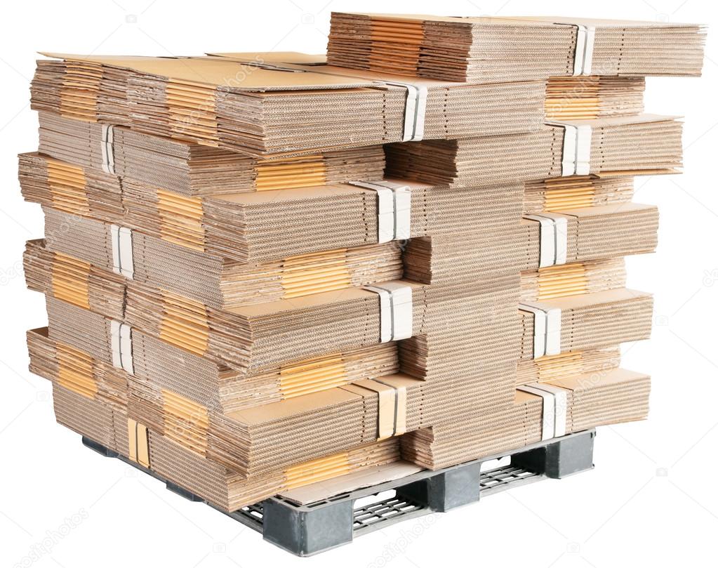 carton box parts on plastic pallet isolated on white