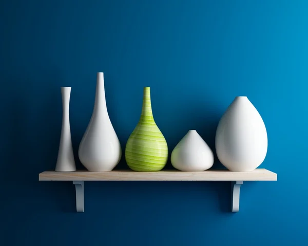 Vase on shelf with blue wall interior — Stock Photo, Image