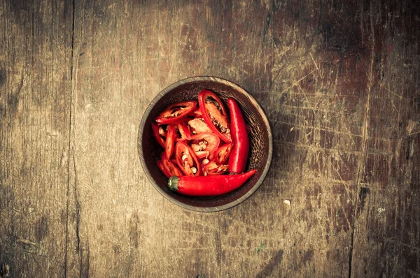 Chili slice in wood bow on wooden — Stock Photo, Image