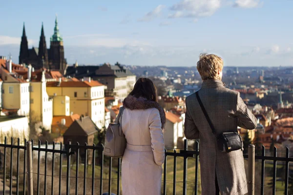 Young couple observing view of Prague — Stock Photo, Image