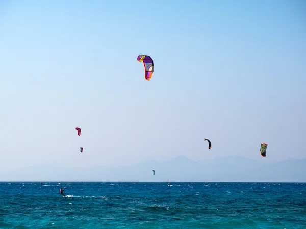 Kite surfers  in a sunny windy day — Stock Photo, Image