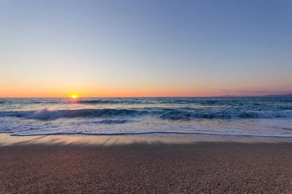 Strand en zonsondergang — Stockfoto