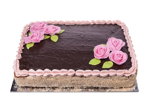 Para pastel de chocolate con flores de rosas. — Foto de Stock