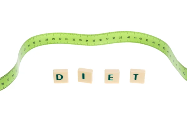 Letterlijke woord dieet. Met meting van meter in de achtergrond. — Stockfoto